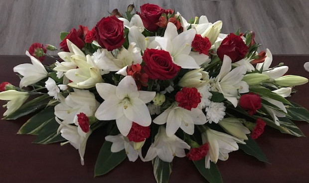 Rose and Lilly casket spray