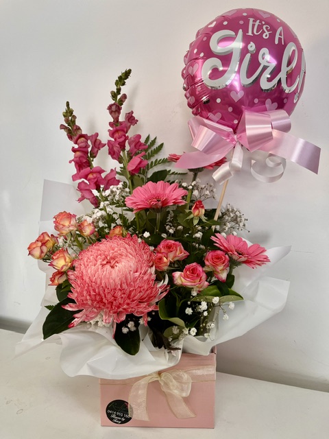 Baby girl display with balloon